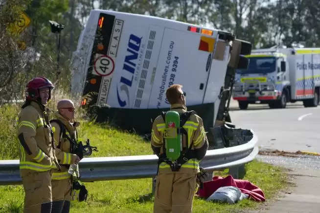 Near Sydney, a bus carrying wedding guests rolls over, killing 10 people and injuring another 25.