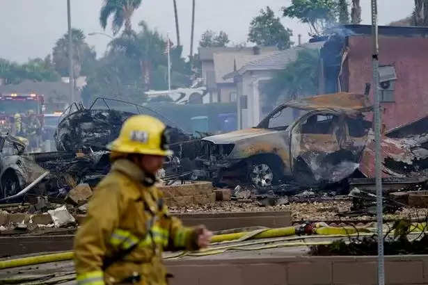Plane crashes into California homes, 2 dead