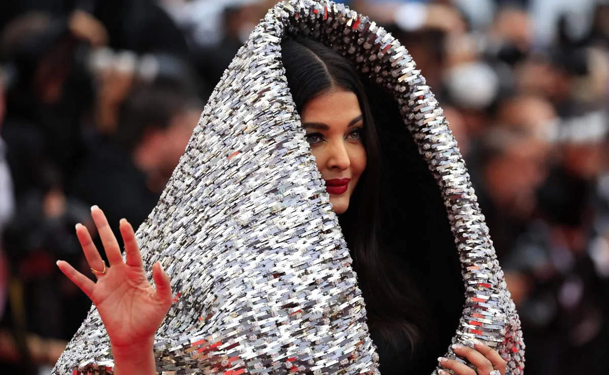 The internet both adores and despises Aishwarya Rai Bachchan's silver hood in Cannes 2023 because she "did it for the memes