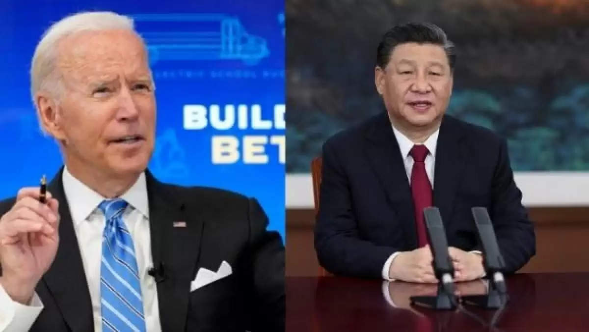 Chinese President Xi Jinping, right, shakes hands with US President Joe Biden